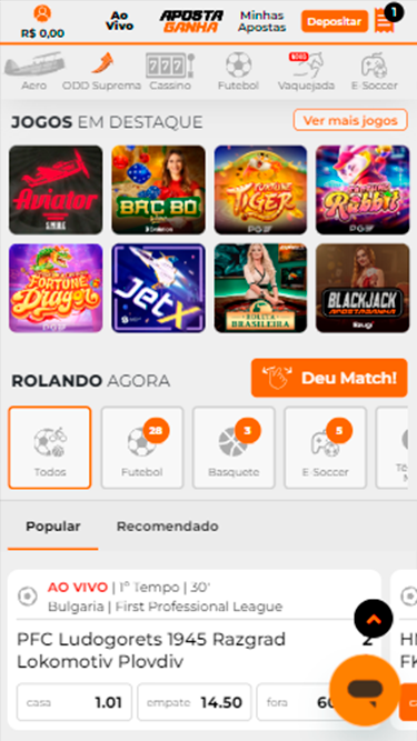 Captura de tela demonstrando a plataforma da Aposta Ganha e as diferentes seções pelas quais se pode navegar: Jogos em Destaque, Rolando Agora, Popular, Recomendado, etc.