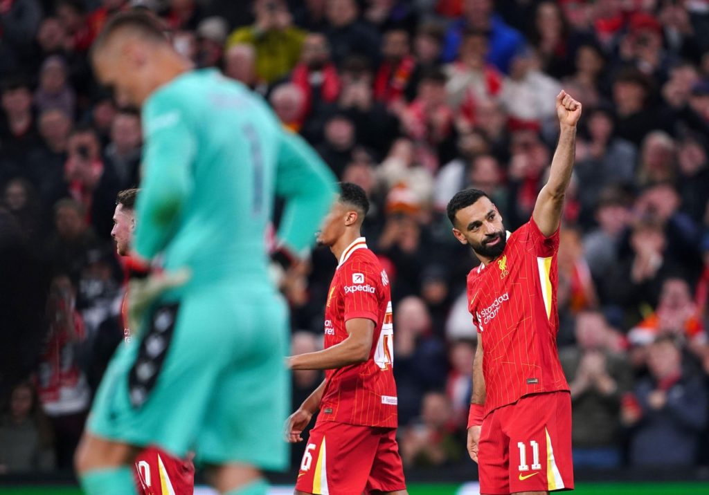 Salah, do Liverpool, comemorando um dos gols do time na Champions League.